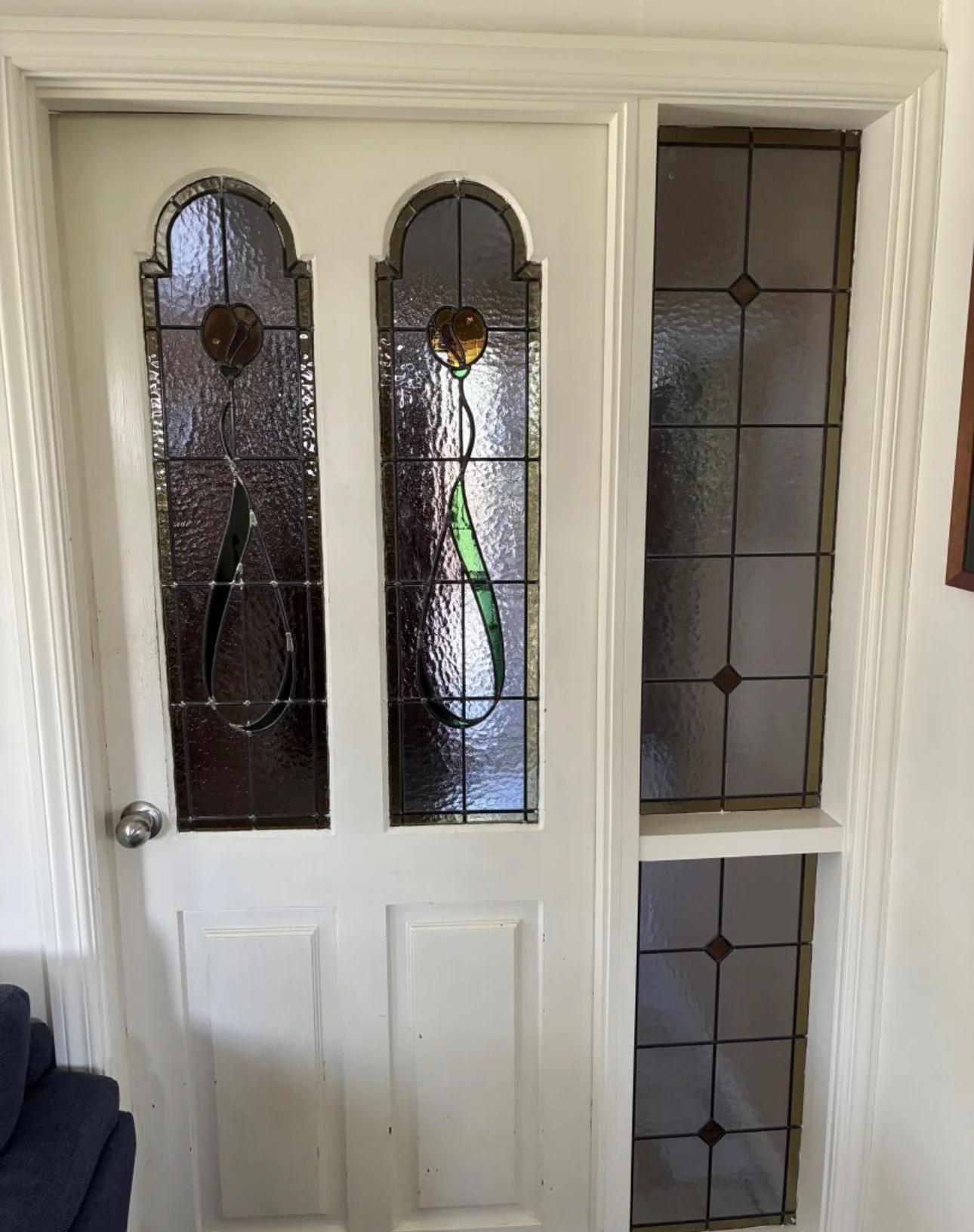 Restored villa door with stained glass detail in Christchurch
